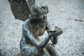 bronze angel in cemetery on a tomb Royalty Free Stock Photo