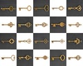 Bronze antique keys on black and white chess background