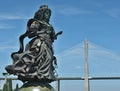 Statue of Catherine of Braganza with Vasco da Gama bridge , Lisbon - Portugal Royalty Free Stock Photo