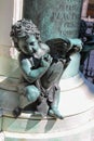 Bronze baby at base of Alessandro Farnese monument,