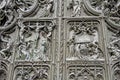 Bronze bas-reliefs of the Pieta scene in bas relief at Milan`s Cathedral doors Royalty Free Stock Photo