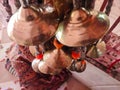 Bronze bells kept in a temple with orange ascents Royalty Free Stock Photo