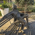 Bronze Benjamin Franklin sculpture by Gary Lee Price at the Dallas Arboretum in 2023.