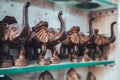 Bronze brass elephant statues for sale in Old Delhi. Selective focus on one statue