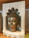 Bronze Buddha Head in Marble Display