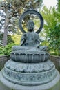 Bronze Buddha Statue in Japanese Garden Royalty Free Stock Photo