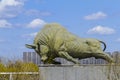 A bronze bull statue in a park. Royalty Free Stock Photo