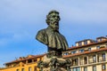 Bronze bust of Benvenuto Cellini mounted on the Ponte Vecchio bridge in Florence, Italy Royalty Free Stock Photo