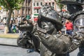 Bronze-cast sculpture of man in helmet and with a weapon