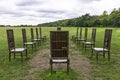 12 bronze chairs - Jurors artwork by Hew Locke in Runnymede, Surrey, UK