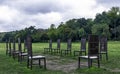 12 bronze chairs - Jurors artwork by Hew Locke in Runnymede, Surrey, UK