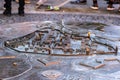 Bronze City Map Relief Sculpture with Water Puddles
