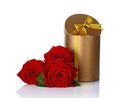 Bronze classic shiny round gift box with golden satin bow and bouquet of roses