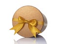 Bronze classic shiny round gift hat box with golden satin bow Royalty Free Stock Photo