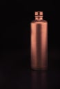 Bronze colored ceramic bottle Royalty Free Stock Photo