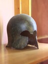 Bronze Corinthian helmet, nose guard broken off. First quarter of the 7th century BC, Ancient Greece