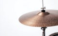 Bronze Cymbal on White Background Royalty Free Stock Photo