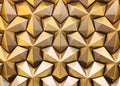 Bronze 3D interior decorative wall panel with unusual geometric shape. Brown metallic background with pattern. Abstract