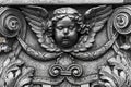 Bronze decor elements decorating the sculpture of the head of Cupid angel with figured wings of monograms with a vegetable pattern