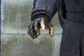 Wrist. Detail of a bronze monument.