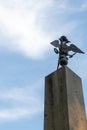 Bronze double-headed eagle on a monument in a city park. Uman. Ukraine