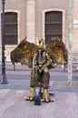 Bronze dragon mime on La Rambla street