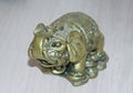 Bronze elephant figurine with a raised trunk Royalty Free Stock Photo