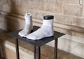 Bronze feet in socks by Nino Longobardi in a room of the Castel Del Monte