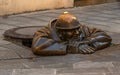 Bronze sculpture called Cumil -The Watcher, or Man at work, Bratislava, Slovakia Royalty Free Stock Photo