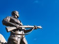 The bronze figure of a soldier with rifle from the Port Sunlight War Memorial by Sir William Goscombe John RA. Royalty Free Stock Photo