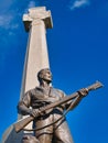 The bronze figure of a soldier and rifle with runic cross behind from the Port Sunlight War Memorial by Sir William Goscombe John Royalty Free Stock Photo