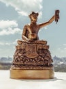 Bronze figurine of Phra upagupta or Phra bua khem statue with nature background