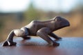 Bronze frog sculpture