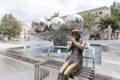Bronze girl statue and Fountain Square in Baku, Azerbaijan
