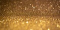 Bronze glitter lights. Shiny sparkles, bokeh effects, glowing surface. Selective focus, christmas abstract banner Royalty Free Stock Photo