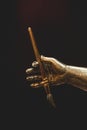 Bronze hand with brush