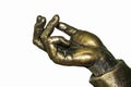 Bronze hand shows gestures with fingers, isolate