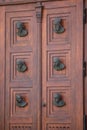 Bronze heads on the door of the Mariacki