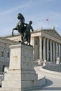 Bronze horse tamer statue in front of Austrian Parliament Building in Vienna, Austria