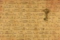 Bronze keys on randomly placed music notes from computer showing antique sepia effects from printing on inkjet printer