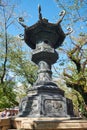 The bronze lantern in the garden of Yasukuni Shrine in Chiyoda, Tokyo. Japan