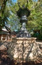 The bronze lantern in the garden of Yasukuni Shrine in Chiyoda, Tokyo. Japan