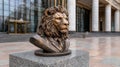 Bronze lion bust wearing a suit in front of a building. Royalty Free Stock Photo