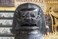 Bronze lion or Chinese Sculpture at the Temple of the Emerald Buddha in Bangkok Royalty Free Stock Photo