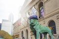 Bronze lion wearing the Chicago Cubs hat Royalty Free Stock Photo