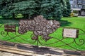 Bronze map of Ukraine on the back of a wooden Family bench on Sicheslavska embankment in Dnipro.