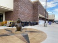 A bronze mascot Beaver Statue at a Buc ees