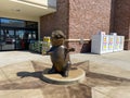 A bronze mascot Beaver Statue at a Buc ees
