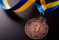 Bronze medal on a dark background