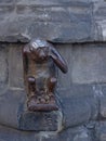 Bronze monkey sculpture at Mons town hall